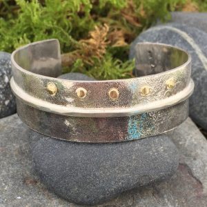 Darkness and Light silver and gold bracelet by Saucy Jewelry